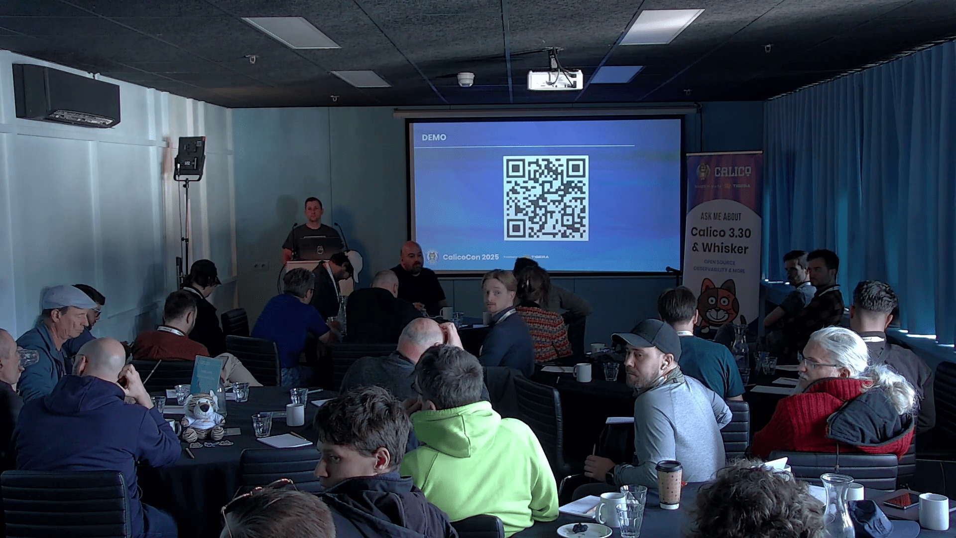 Ivan Sharamok presents at CalicoCon 2025 to an audience.