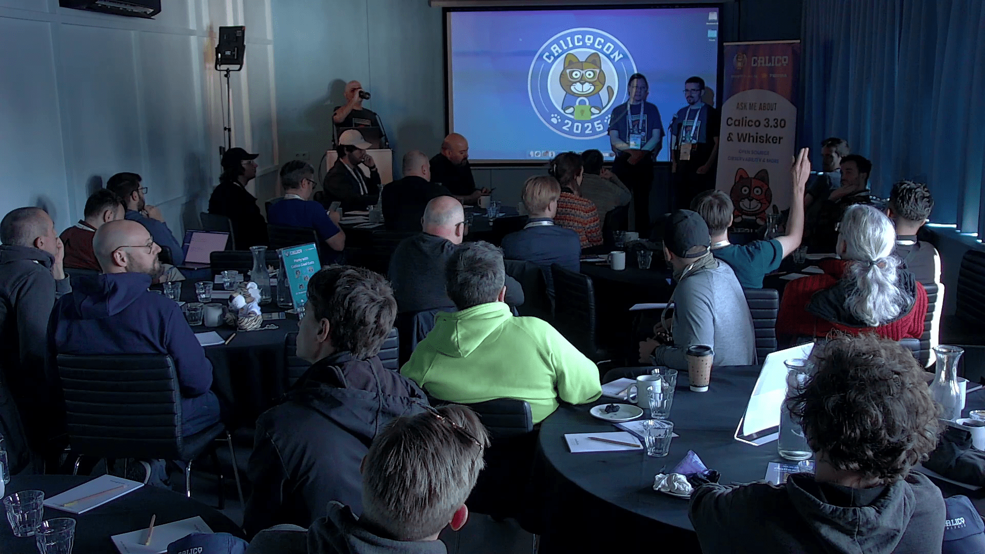 Attendees at CalicoCon ask questions to engineers during an AMA session.