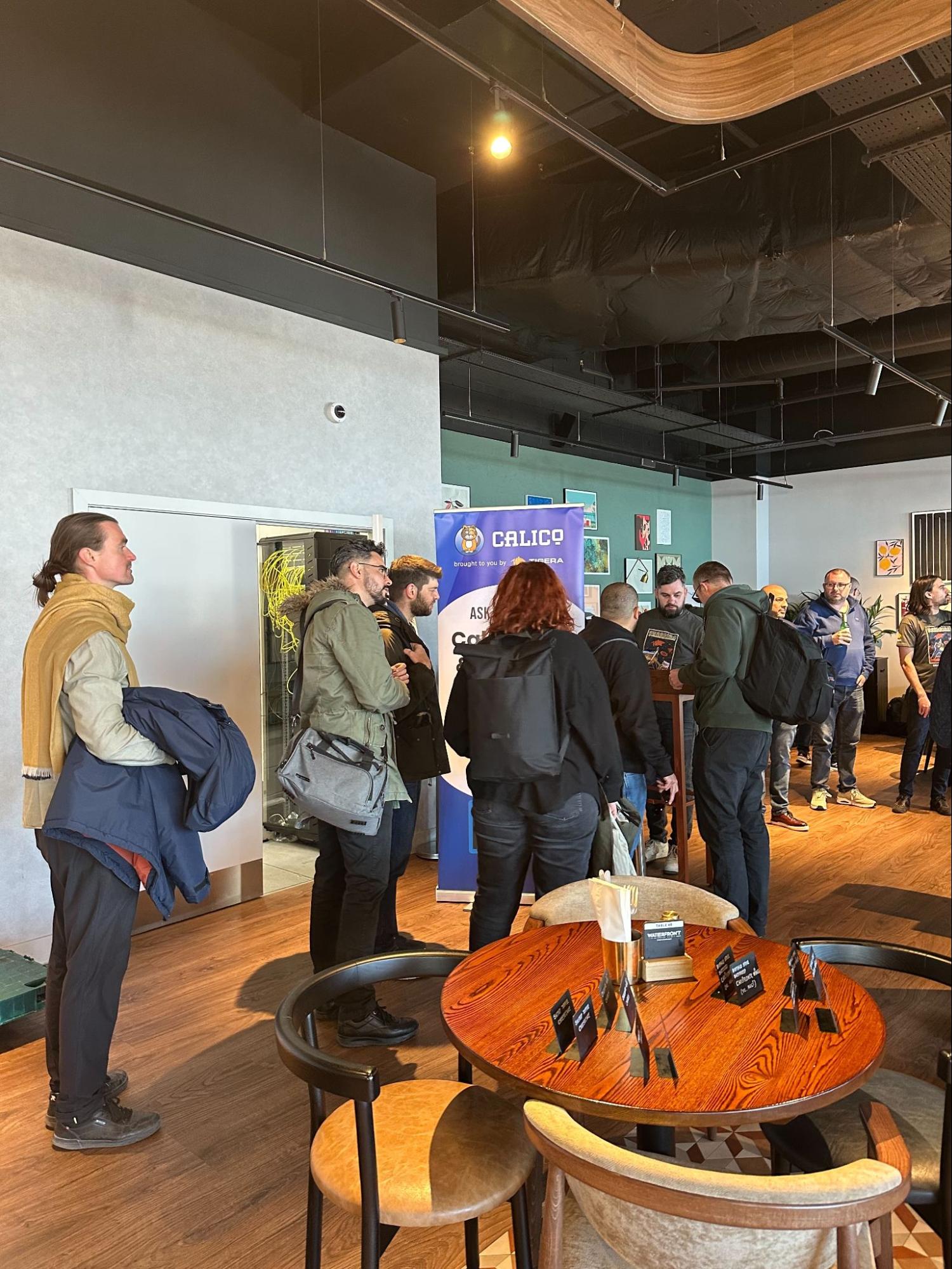 Attendees socialize at a casual Project Calico community event.