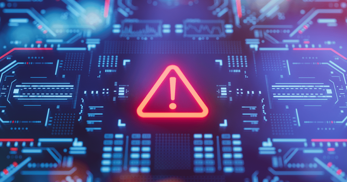 A glowing red warning triangle appears on a futuristic blue circuit board.